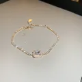 Elegant gold finish zircon tennis bracelet with a sparkly rectangular center stone - 59# Bracelet - Gold - Rectangular
