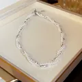 Detail view of twisted silver bead and pearl necklace on display tray - Twisted Style (17#) / Silver