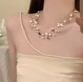 Close-up of a multi-layer dopamine zircon necklace featuring pearls and blue accent stones - Multi-layer Floating Bead Style (21#) / White-Blue
