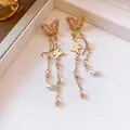 Eleganti orecchini pendenti a farfalla color oro con perline ambra e perle bianche - Ago Argento 36# - Standard - Oro - Rosa