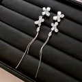 Eleganti orecchini lunghi con nappe e pietre trasparenti a forma di fiore argento - Ago D'argento N. 48 - Argento (placcato Oro)