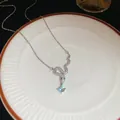 Silver tone snake pendant necklace with sparkling cubic zirconia and heart stone detail - Snake Heart Zirconia Style (58#) / Silver