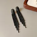 Elegant long black rhinestone tassel drop earrings featuring a shimmering dark crystal finish - Arc-Shape Black Tassel Style (20#银针-枪黑色-圆弧) / Gunmetal