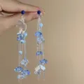 Boucles d'oreilles pendantes à pompons avec perles en zircon bleu et fleurs blanches. - Style de Gland en Perles Frais (53#)