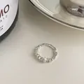 Macro view of minimalist irregular silver ring with white pearls and geometric beads - Irregular Pearl Elastic Style (1#)