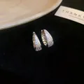 Orecchini a cerchio a U in argento con zirconi cubici scintillanti - 56# Orecchino - Argento