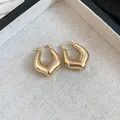 Eleganti orecchini a cerchio a forma di U placcati oro con finitura lucida - Orecchino 60# - Ecologico - Oro