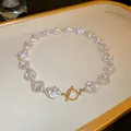 Elegante collana di perle francesi irregolari con raffinata chiusura a T in tonalità oro. - 8# Collana Con Fibbia OT in Perle Irregolari Bianche