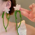 Elegant forest style pink flower earrings featuring long green faceted crystal bead tassels. - 78# Silver Needle - Pink - Green
