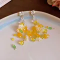 Detailed view of colorful floral beaded earrings with sparkling square crystal studs. - Style No.46(46#) / Silver Needle / Green