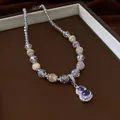 Elegante collana di perle in stile bohémien con pendente a zucca viola e vetro sfaccettato - Collana No. 58 (Zucca Viola)
