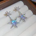 Elegant zirconia snowflake drop earrings with high-sparkle finish and silver needle posts - Snowflake Drop / Silver