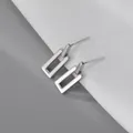 Close-up of sleek silver-tone rectangular drop earrings with S925 engraved posts - Style 18 / Silver