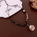 Gros plan détaillé d'un collier de style Zen avec des perles en bois et un pendentif lotus - 1# Collier (HN6659-1)