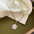 Collier vintage style ethnique avec cordon vert, pendentif fleur argenté et perles - 31# Collier (HN6659-1)
