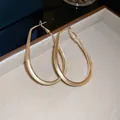 Elegant matte gold U-shaped hoop earrings with a minimalist brushed finish design - Style 5 / Gold - Water Drop