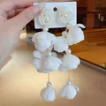 Elegant white forest style floral dangling earrings with pearl heart clusters for women - White