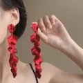 Elegant long red rose petal tassel earrings with a professional matte satin finish for women - Stud Earrings / Red