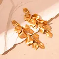 Fashionable matte gold rose petal tassel earrings with a bohemian statement style - Stud Earrings / Gold
