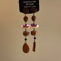 Detailed view of retro dangling earrings featuring wooden beads and layered discs. - Style 15 Layered Long Earrings with Silver Post / Brown