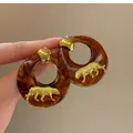 Elegant vintage tortoiseshell resin hoop earrings with gold tiger detail for women - Style 22 Vintage Tiger Hoop Earrings with Silver Post / Gold Brown