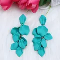 Fashionable turquoise rose petal tassel earrings with a matte finish for a bold look - Stud Earrings / Cyan