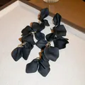 Elegant matte black rose petal tassel earrings with delicate gold chains for women - Stud Earrings / Black