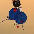 Stylish retro oversized blue round disc earrings with red beads and cord bow accents. - Style 32 Bowknot Round Earrings with Silver Post Blue / Blue