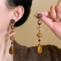 Vintage Maillard style long earrings with wooden beads and teardrop pendants macro view - Style 4 Brown (S925 Silver Pin)