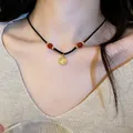 Elegant new Chinese style braided necklace with red beads and round gold Fu pendant - Red Bean Fu Character Style (13)