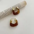 Elegant vintage U-shaped earrings with amber resin texture and gold metallic accents - U-Shaped Tortoiseshell Buckle (12#) / Gold Brown