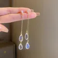 Elegant long tassel earrings with clear teardrop pendants and crystals - Silver Rhinestone Water Drop Tassel