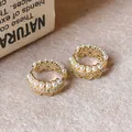 Elegant vintage gold hoop earrings decorated with white pearls and delicate crystal lace - Gold-White