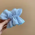 Elegant light blue ruffled seersucker scrunchie hair tie with textured fabric for women - Seersucker Ruffled Style (HH6870) / Blue