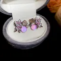 Exquisite pink butterfly stud earrings with sparkling crystals in a grey velvet box - Purple