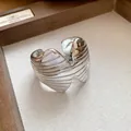 Detailed macro view of the silver ribbed texture on the geometric open cuff bracelet. - Horizontal Texture Style (HB4189)
