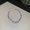 Detailansicht eines eleganten silbernen Herzarmbands mit rosa und weißen Zirkonsteinen. - Silbernes Rosa und Weiß Abwechselndes Herz-Zirkonia-Armband (39#)