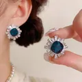 Korean style gold geometric stud earrings with deep blue zircon and sunburst design - Silver Earring Post - Gold - Blue