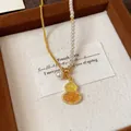 Detail of gold-plated gourd necklace with zircon and pearls in Neo-Chinese style - Gold-Beige