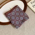 Detailed view of vintage geometric pattern square scarf on wooden tray. - Dark Brown White Geometric Floral Style (7#)