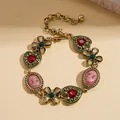 Vintage gold bracelet with red heart gems and pink cameo charms - Bracelet-Green
