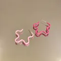 Orecchini a cerchio a forma di stella ondulata rosa e magenta con aghi in argento 925 - Stile Stella Onda Rosa
