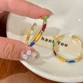Orecchini a cerchio in smalto colorato con ago in argento e strass dorati. - Smalto Multicolore Strass Piccolo