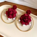 Detail of vintage red fabric rose earrings with golden hoops and pearls - Rose Flower Hoop Style / Gold-Red