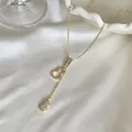 Elegant gold-plated gourd necklace with sparkling stone-encrusted Hulu pendants - Gold Hollow Gourd Style