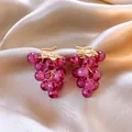 Elegant luxury purple grape cluster stud earrings with gold leaf detail on satin. - Style 22