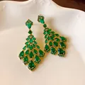 Elegant gold-tone chandelier earrings featuring teardrop green zirconia stones design - Vintage Green Pendant Style (18#银针-金色-绿色) / Green