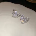Close-up of heart-shaped zircon earrings with square-cut crystals and silver cage design - Silver Real Gold Plating (10#)