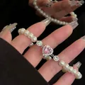 Détail d'un bracelet de perles de luxe avec un zircon rose en forme de cœur au centre - Style Pierre Principale Coeur Rose (19#) / Or-Rose