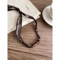 Vintage ethnic style fabric necklace featuring dark brown wooden beads on printed cord - Brown (Geometric Print)